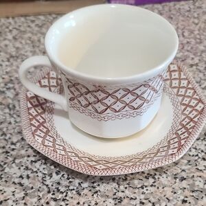 Elegant Brown Patterned Cup and Saucer Set